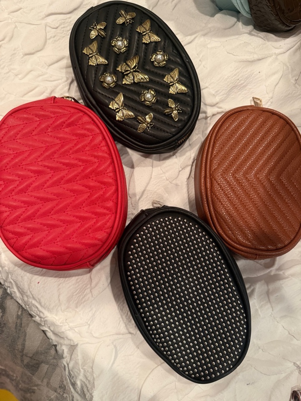 Set of 4 Oval Quilted & Studded fanny packs - Black, Red, Brown